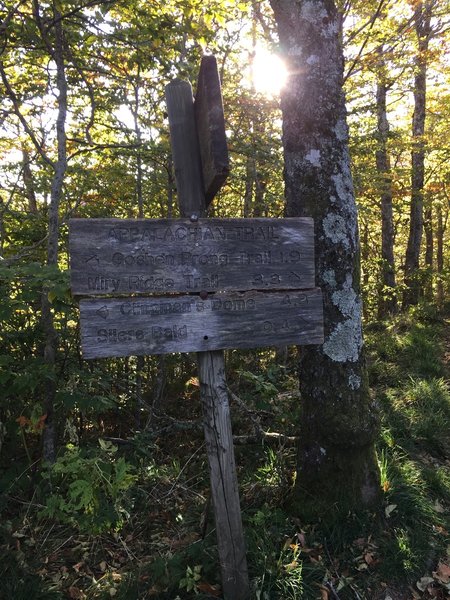 If you need to stay in Silers Bald Shelter, go west for 0.6 miles at this sign.