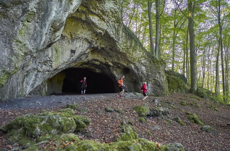 Coming out from the pass-through cave Oswaldhöhle. Photo: Peter Fecher.