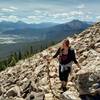 Taking a short break in the midst of the huge boulder field. Dillon Reservoir glitters in the distance.