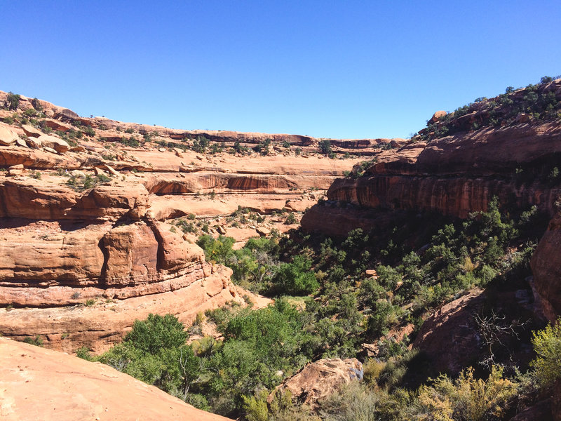 Dropping into the canyon before heading up the other side to the ruins.