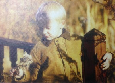 Playing with "cotton" on the coy pond footbridge.