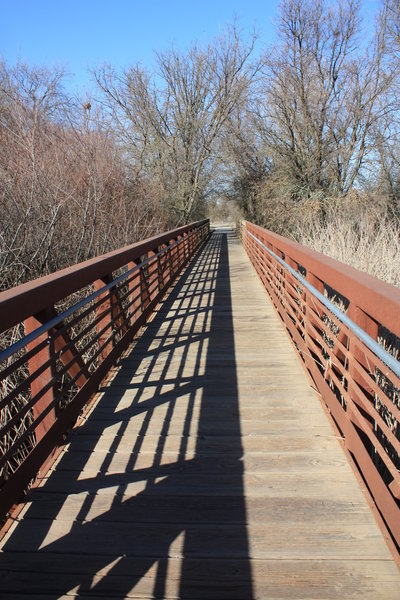 A long bridge on the Lost Slough Wetlands Walk Trail.