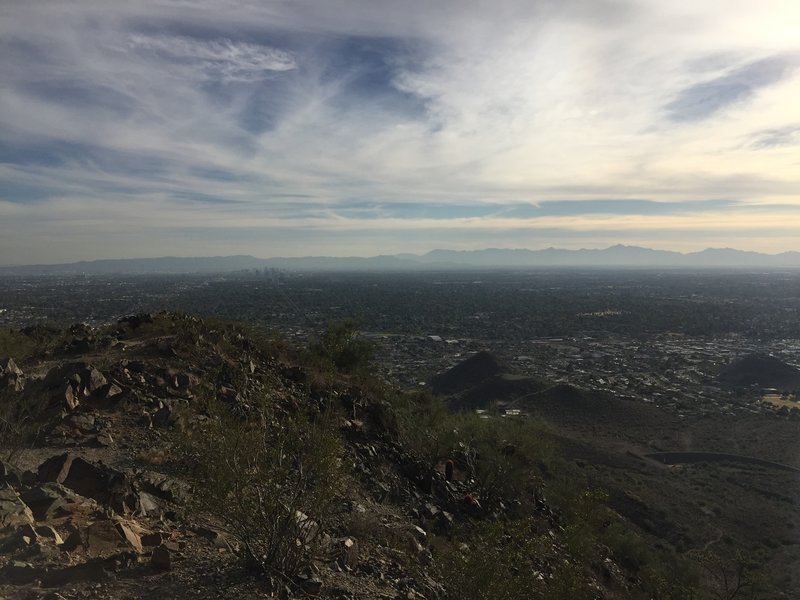 Looking from peak. Downtown Phoenix with South Mountain behind.