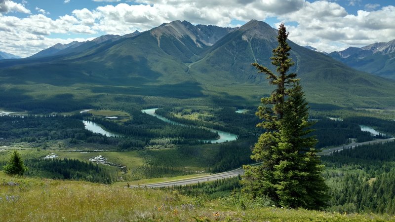 The meandering Bow River and craggy, yet stunning Sundance Peak present an incredible backdrop to any adventure along Cory Pass in Banff, Alberta.