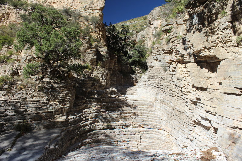 The stairway into Devil's Hall is very slippery, so be careful, but continue on to be amazed by this natural wonder.