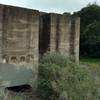 Ruins of Scott Furnace dust bins, built around 1915, at the site of the old Senador Mine.