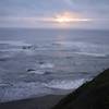 A California Sunset, admired from the rocky shores of Enderts Beach.