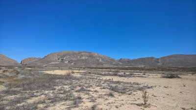 A view near the trailhead. Dog Canyon on the left, Devil's Den on the right.