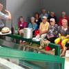 Visitors take in a ranger-guided program at the Big South Fork NRRA Blue Heron Outdoor Museum.