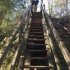 The Twin Arches loop trail has a set of steep stairs leading down to the Arches from the Trailhead parking lot.