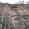 Double Arch looms overhead when seen from the trail below.