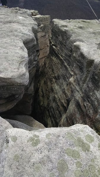 The rocks exhibit a wide, weathered crack at the Raven Rock Overlook.