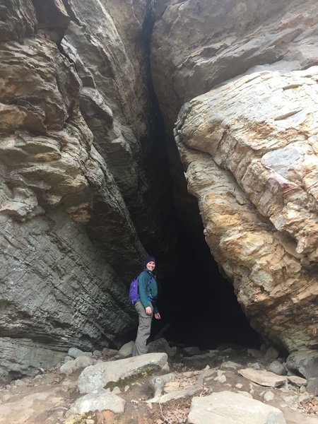 My hiking buddy enjoys a very cool small cave with flat floor. It only goes in about 20 feet, but it's a good place to take shelter from a storm.