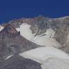 Crater Rock (foreground) and the Bergschrund Crevasse can be seen from the Mountaineer Loop Trail. Photo by John Sparks.