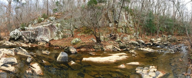 The Rhodo Cliffs offer a beautiful backdrop to the waters of New Hope Creek.