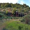 This is the view approaching the remnants of April Trestle on April Trail. Mining ore cars brought cinnabar (mercury ore) out of the April Tunnel at the left end of April Trestle.