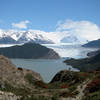 Two couples overlook Glaciar Grey in Parque Nacional Torres del Paine.