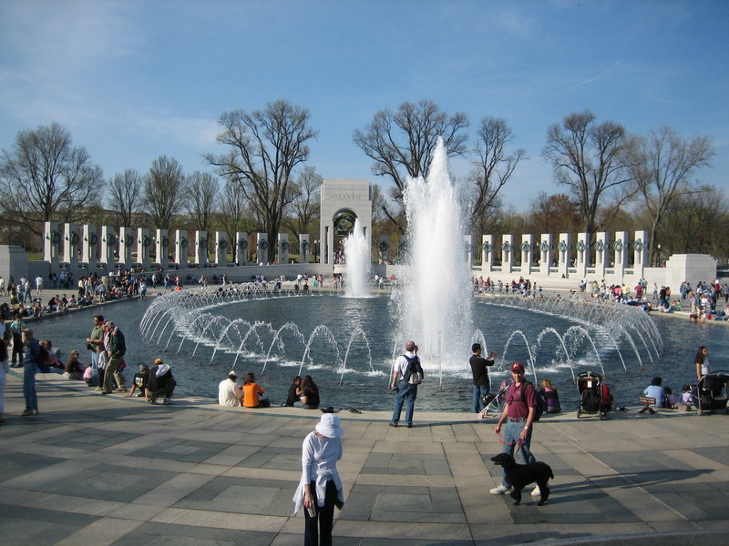 The WWII Memorial bustles with visitors as they appreciate and commemorate those who were lost.