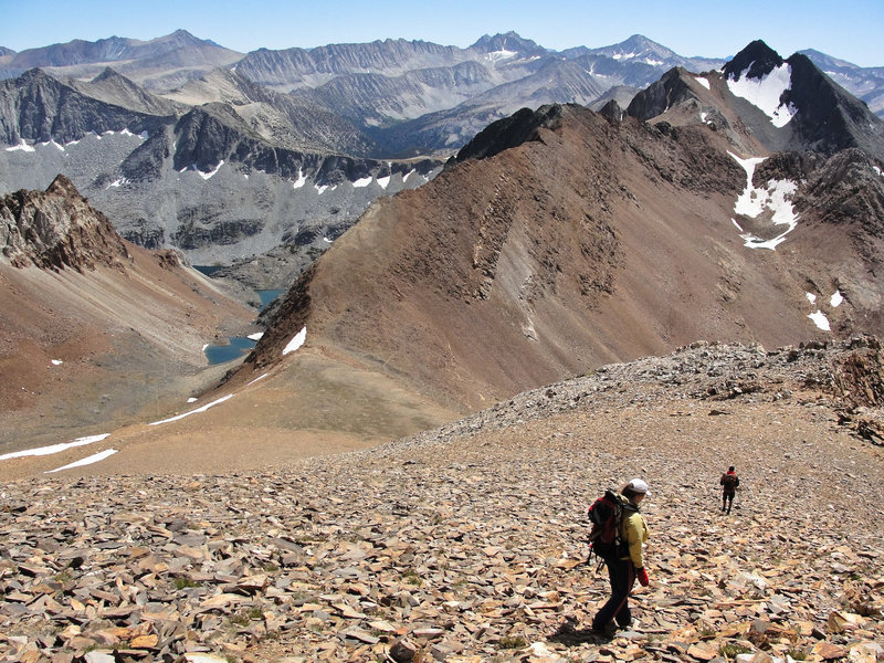 Hikers descending to McGee Pass from Red Slate Mountain.