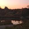 A beautiful sunrise reflects off the water at Banner Lakes in Summerset State Park.