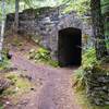 This is the tunnel under the old historic highway on Pioneer Bridle Trail. Photo by John Sparks.