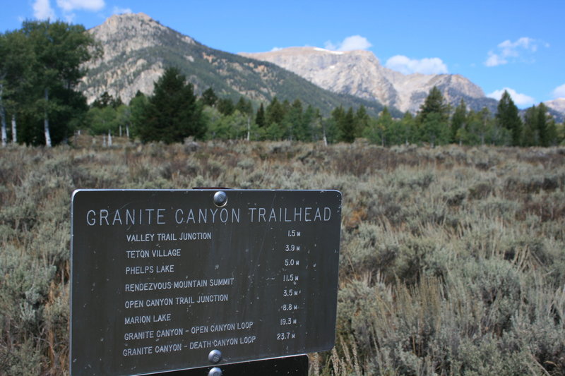 Signage at Granite Canyon Trailhead offers well-marked distances to major locations in the area.