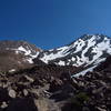 Mt. Shasta (R) and Shastina (L) tower above the talus fields of Hidden Valley.