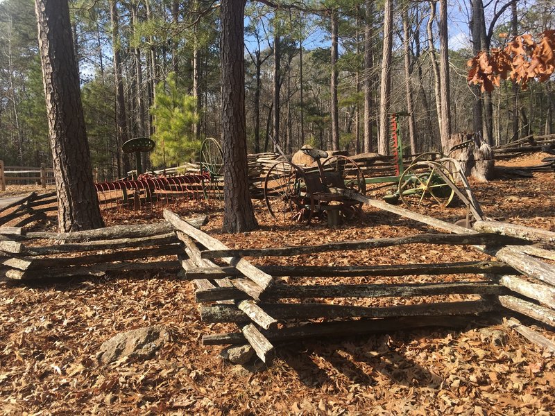 Antique Farm Equipment is on display along the Lakeside Trail.