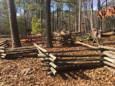 Antique Farm Equipment is on display along the Lakeside Trail.
