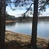 A lake view awaits to the left of the trail's end.