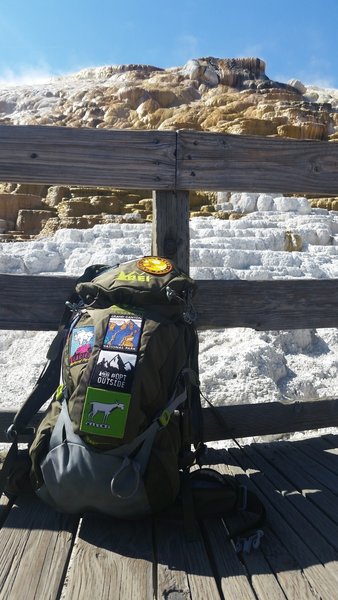 The billowing hot steam and travertine terraces of Mammoth Hot Springs are a must-visit on your trip to Yellowstone.