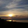 Yellowstone Lake erupts in an orange afterglow at the end of each day.