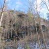 Frog's Head towers in height from the trail below.