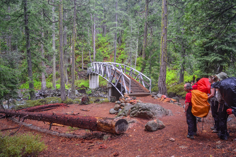 A sturdy bridge ushers hikers over Swift Creek along the Granite Lake Trail.