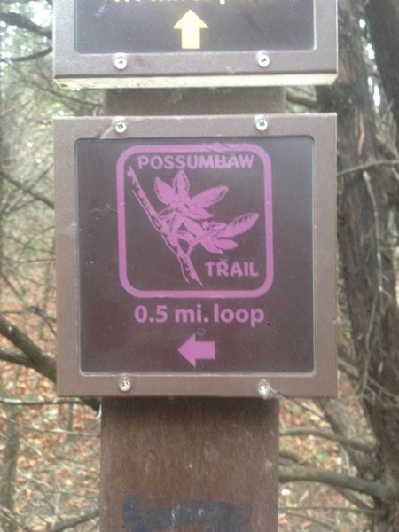 This is a trailhead marker for the Possumhaw Trail at Cedar Ridge Reserve.