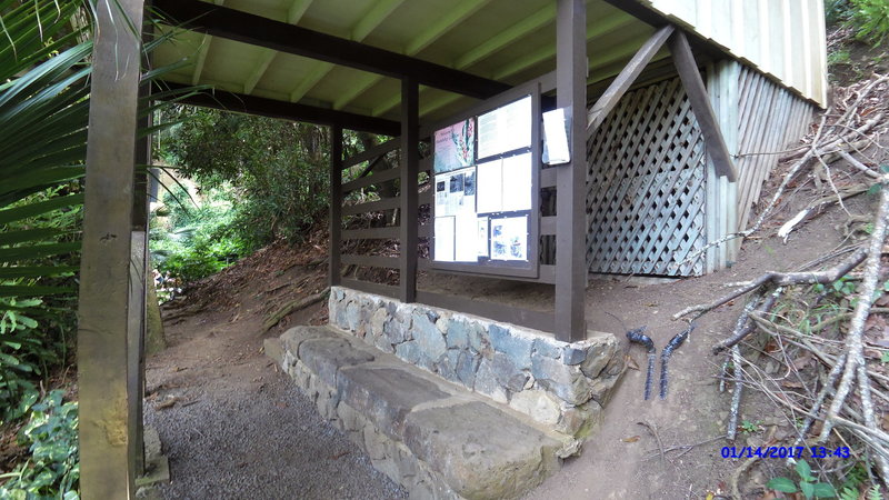 Trail information is located on this board near the trailhead.