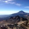 A broad view of some of Mexico's tallest peaks. | En esta foto se parecian tres de las montañas más altas de México, a la izquierda al fondo el Citaltépetl, enfrente el Popocatépetl y a la izquierda la Malinche.