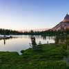 Evening brings a sublime sunset at Upper Cathedral Lake on the John Muir Trail in Yosemite National Park.