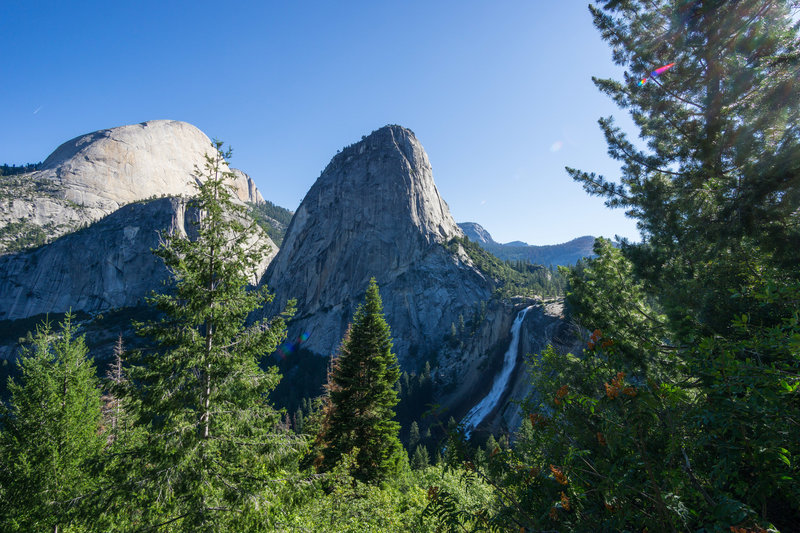 Nevada Fall, Liberty Cap and the back of Half Dome pose for a photo from the John Muir Trail in Yosemite National Park.