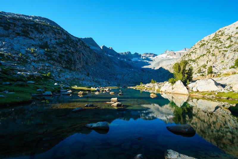 An early morning ascent of Donohue Pass on the John Muir Trail in Yosemite rewards you with this view.