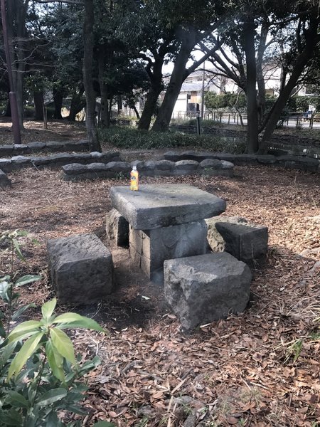 A stone table makes for a great lunch spot along the water's edge.