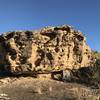 Climb up this trailside boulder to experience great views.