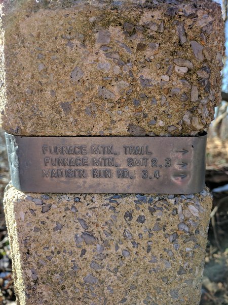 Expect to find this marker for the Furnace Mountain Trail if accessing it from Skyline Drive.