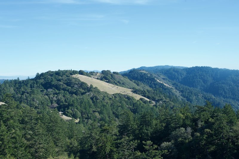 Enjoy this view of the surrounding mountains from the Ancient Oaks Connector Trail. Meadows, possibly created by early Native American inhabitants, can be found throughout the area.