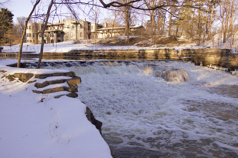 A broad falls cascades behind Henry Ford Estates.