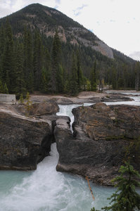 Natural Bridge poses for a photo on a cloudy morning.