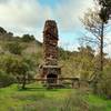 An old fireplace and chimney marks all that's left of a miner's house perhaps?