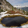 A small tarn greets you along the ascent to Trappers Peak.