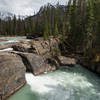 Natural Bridge provides passage over the roaring Kicking Horse River in Yoho National Park.