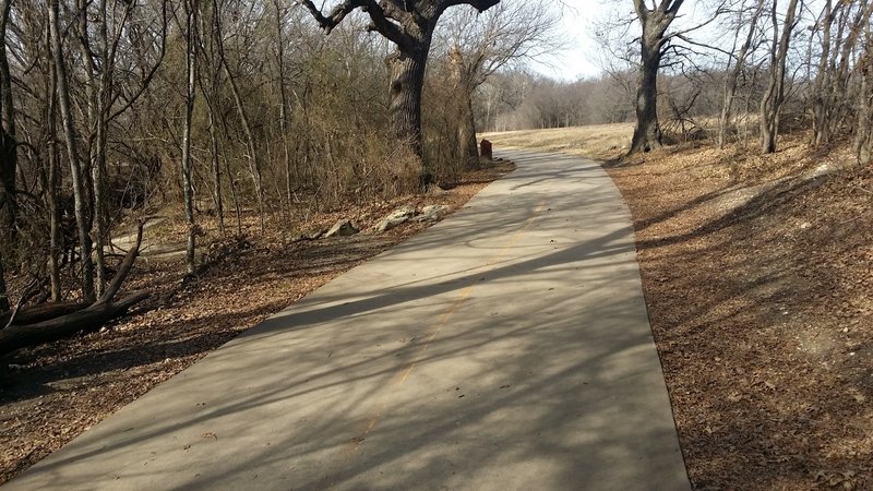 This is a typical section of paved trail in Arbor Hills Nature Preserve.